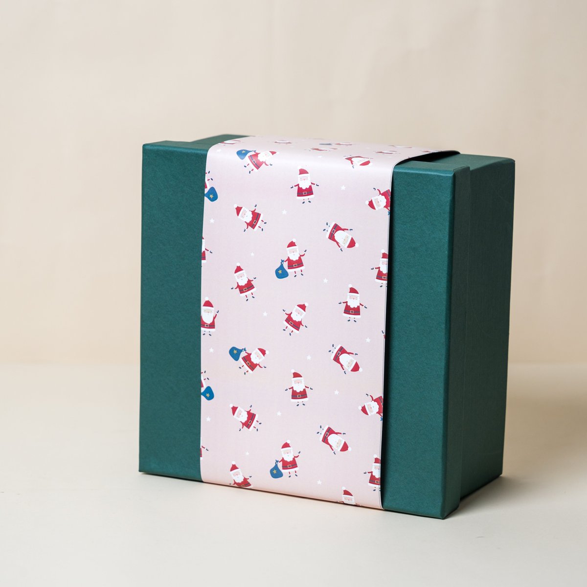 Green Gift Box with Pink Happy Santa Sleeve Main image