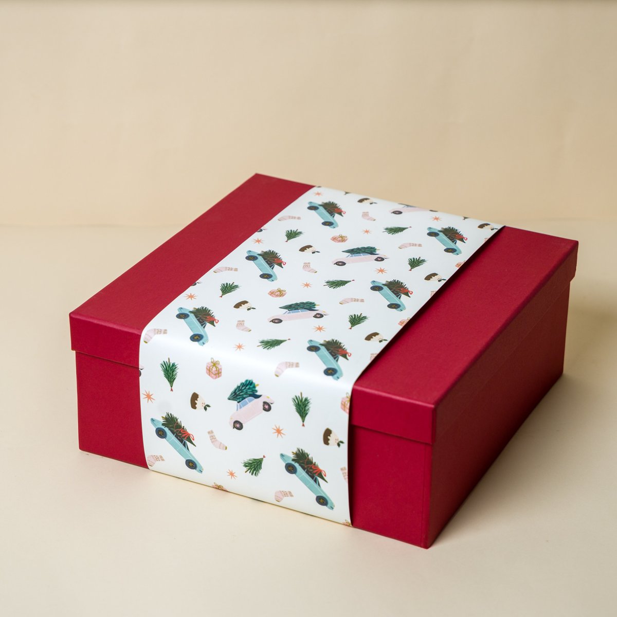 Red Gift Box with Santa's Roadtrip Sleeve Main image