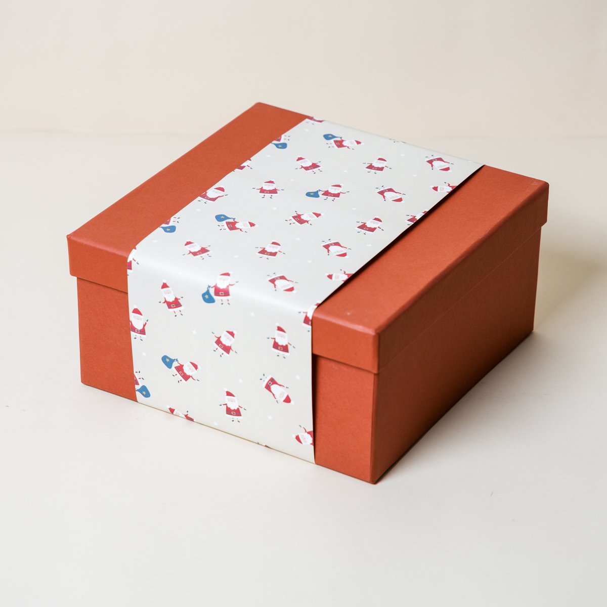 Rust Gift Box with Cream Happy Santa Sleeve Main image